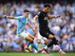 Dominic Solanke dari Tottenham Hotspur mengontrol bola saat berada di bawah tekanan Phil Foden dari Manchester City saat pertandingan Liga Premier antara Manchester City dan Tottenham Hotspur di Stadion Etihad pada 23 Agustus 2025. Foto: Clive Mason/Getty Images Dominic Solanke dari Tottenham Hotspur mengontrol bola saat berada di bawah tekanan Phil Foden dari Manchester City saat pertandingan Liga Premier antara Manchester City dan Tottenham Hotspur di Stadion Etihad pada 23 Agustus 2025. Foto: Clive Mason/Getty Images