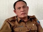 Kepala Dinas Tenaga Kerja dan Transmigrasi (Disnakertrans) Kabupaten Lahat, Mustofa Nelson SSos MM,